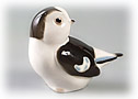See our cute little porcelain Snow Bunting figurine!