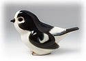 Our Snowy Bunting figurine can be shipped anywhere in the world!