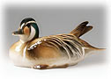This Russian Baikal Teal Duck Figurine brings wild elegance into your home.