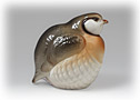 1 of 2 Stone Partridge porcelain figurines, this game bird has a fat, round little body that fits perfectly into your cupped hand.