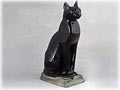 This porcelain Egyptian Cat figurine is clearly no stranger to royalty.