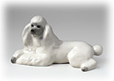  This white Lomonosov porcelain Poodle figurine goes beyond the poodle standard, evoking royalty. 