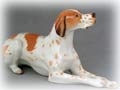 A cousin to the German Shorthaired Pointer, this tan and white Pointer  figurine looks anxious to race across Russian fields in search of wild game