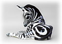 What is the scientific name for Zebras?  You won't care when you see this  black and white striped lovely.