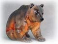 Better learn what Grizzly bears eat because this mighty Grizzly Bear sculpture is sitting and waiting just for you!