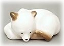 Why isn't this little polar Bear Cub figurine in white bear school? Because he is sweetly sleeping the afternoon away. 