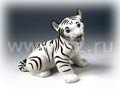 Sweeter than baby Tiger pictures, this little blue-eyed White Tiger Cub figurine is a black and white cutie. 
