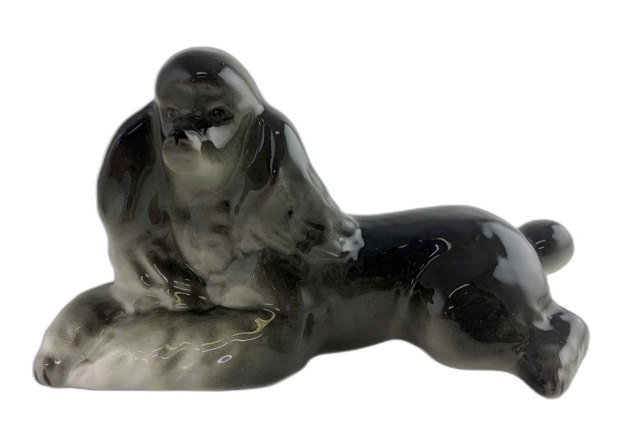 Buy Relaxing Black Poodle Figurine at GoldenCockerel.com