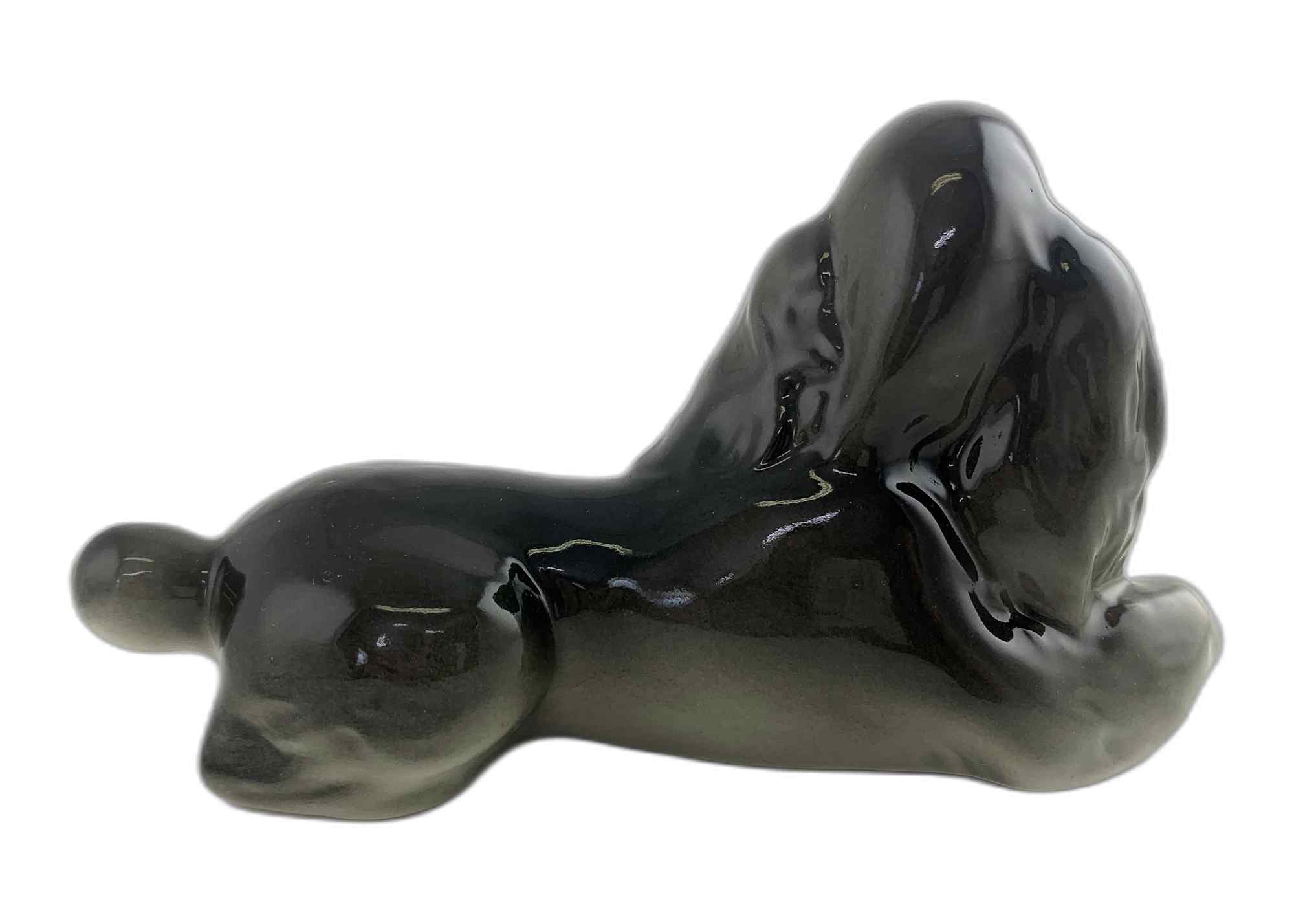 Buy Relaxing Black Poodle Figurine at GoldenCockerel.com