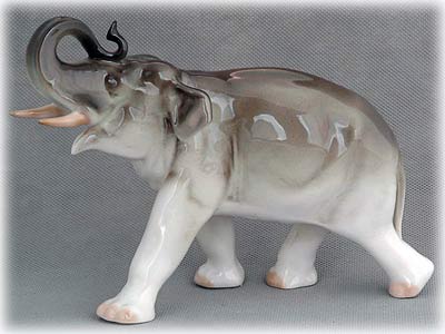 Buy Standing Elephant Figurine at GoldenCockerel.com